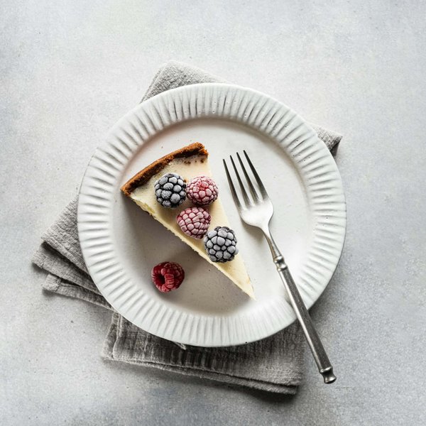 Comment préparer un cheesecake au citron avec une base croquante et une garniture crémeuse ?